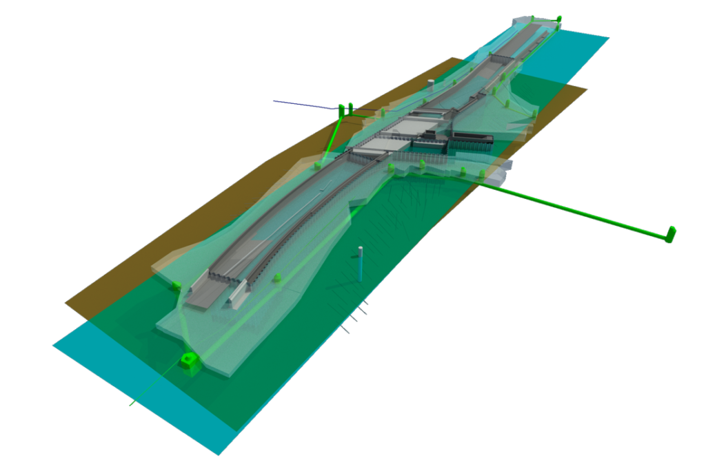 3D model of an infrastructure with tracks and buildings, shown in different colors and levels.